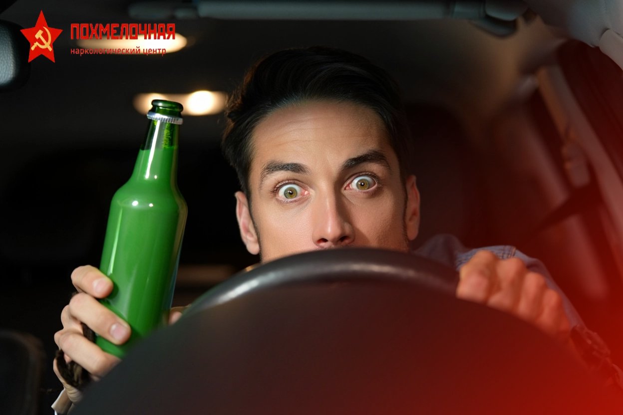 Нетрезвый мужчина за рулём с широко открытыми глазами